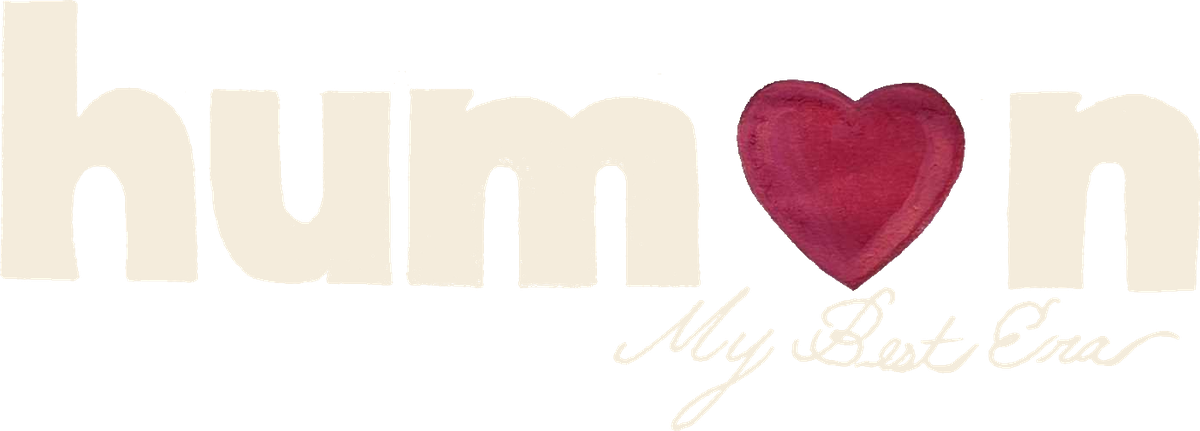 The word human, hand-drawn by Marisa, with a red heart for the letter a, signed My Best Era